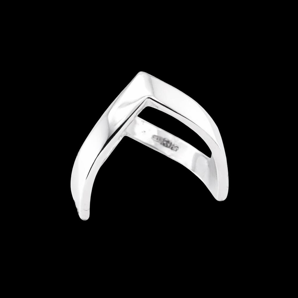 A 9 carat white gold double wishbone ring. with a diamond