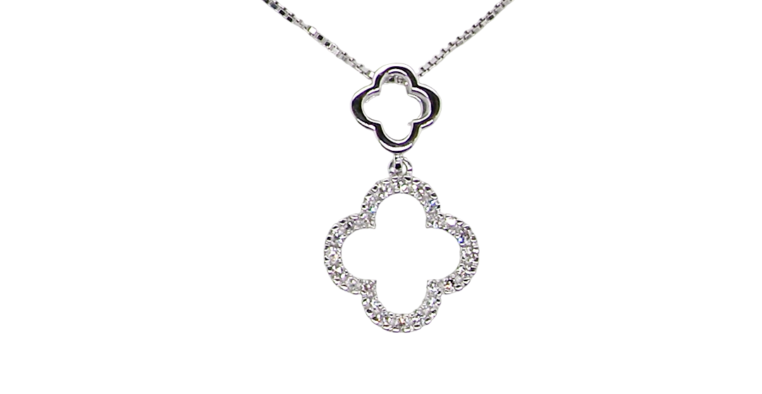 A 9 carat white gold pendant in the 'Alhambra' style. Set with twenty four small white diamonds,