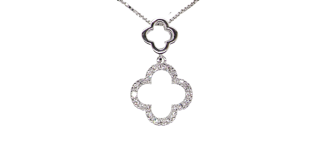 A 9 carat white gold pendant in the 'Alhambra' style. Set with twenty four small white diamonds, carat total 0.12 carats.
