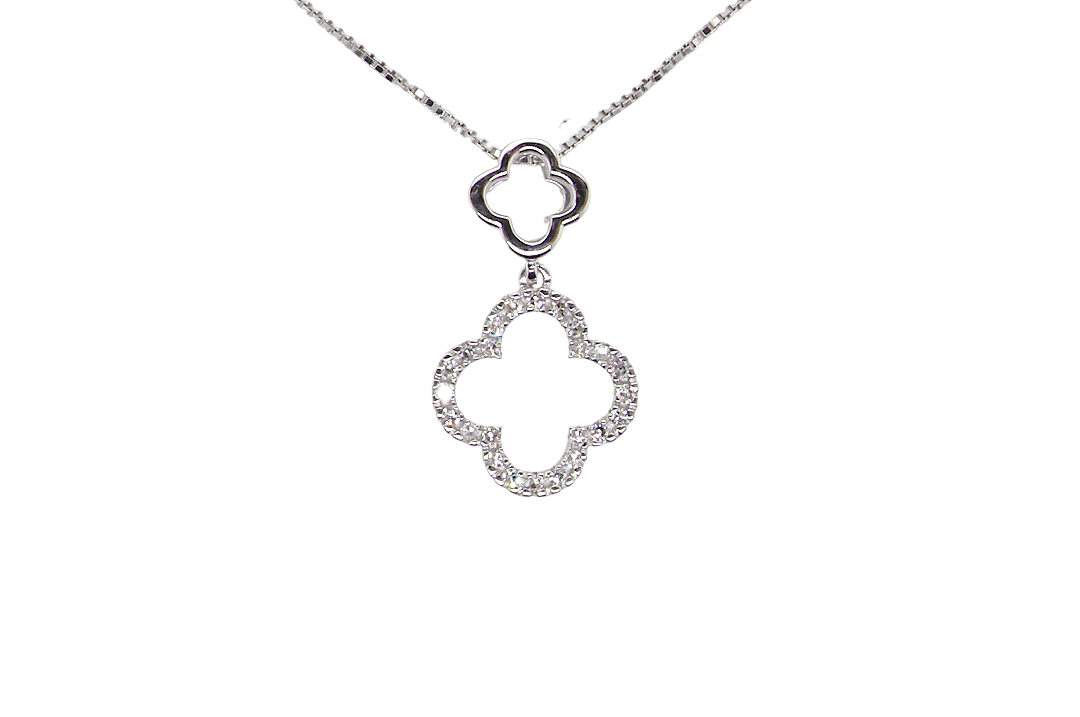 A 9 carat white gold pendant in the 'Alhambra' style. Set with twenty four small white diamonds, carat total 0.12 carats.