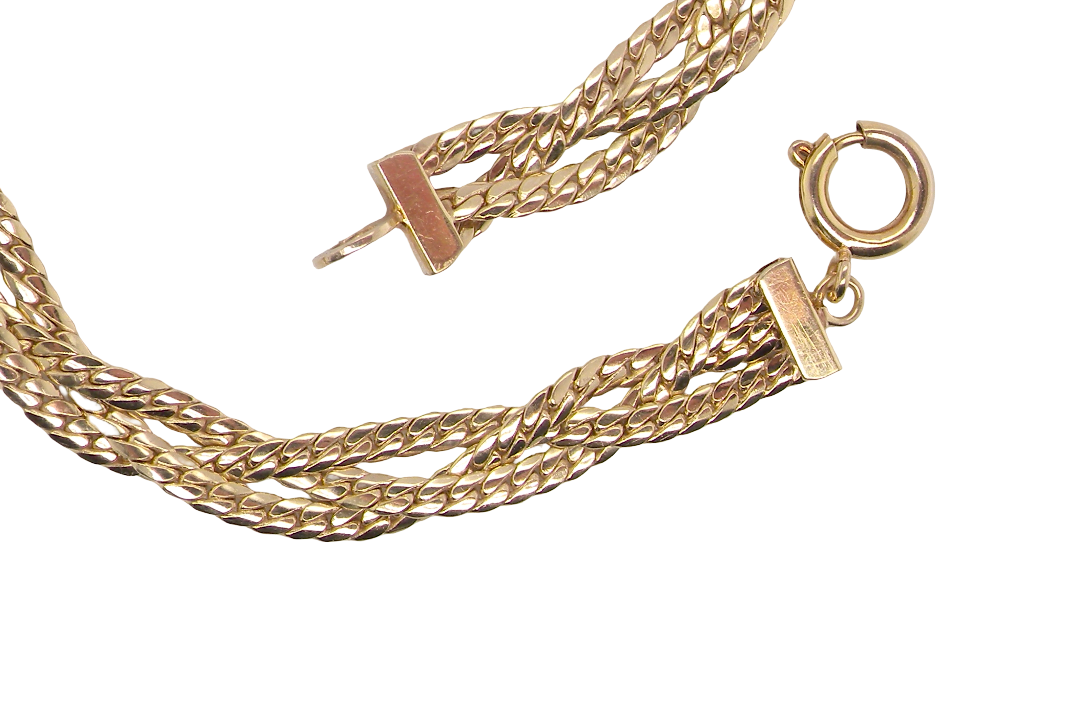 A 9 carat yellow gold bracelet. Plait design of two flat herringbone strands that weave together t