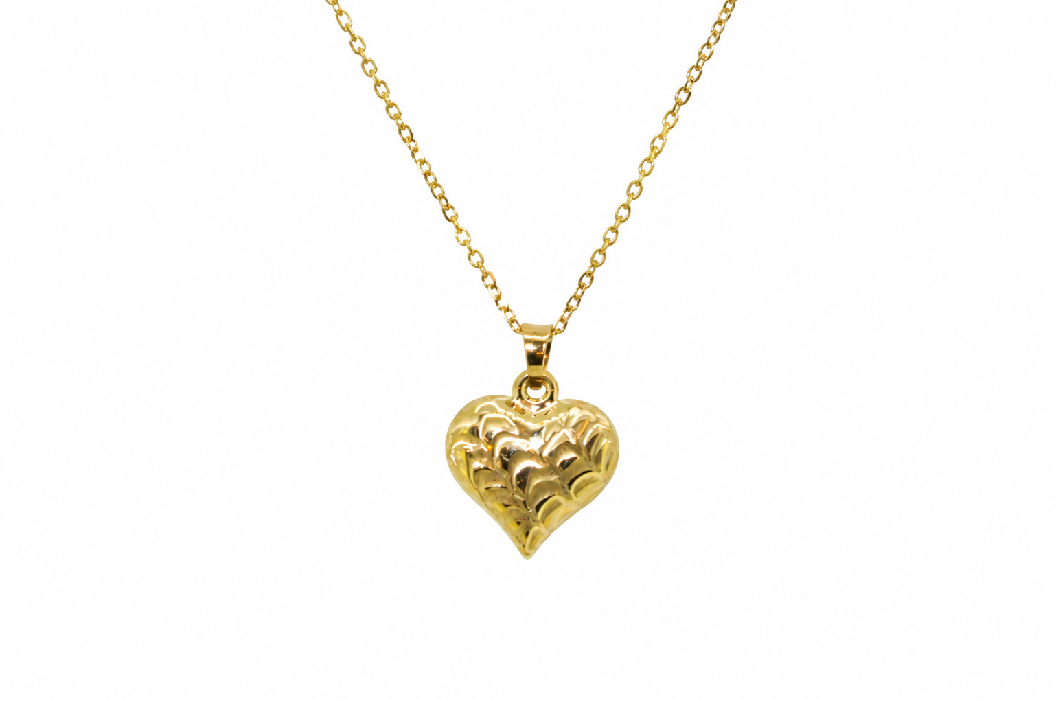 A 9ct gold patterned heart pendant