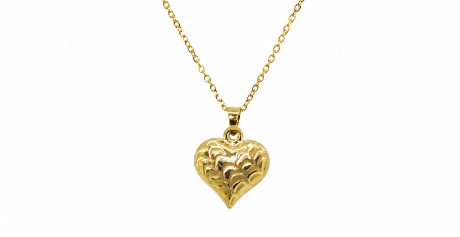 A 9ct gold patterned heart pendant