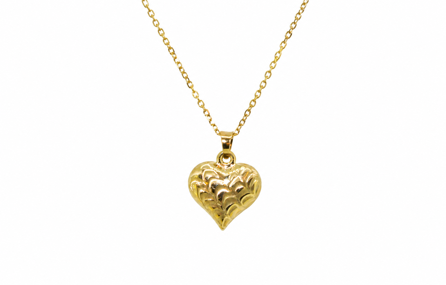 A 9ct gold patterned heart pendant