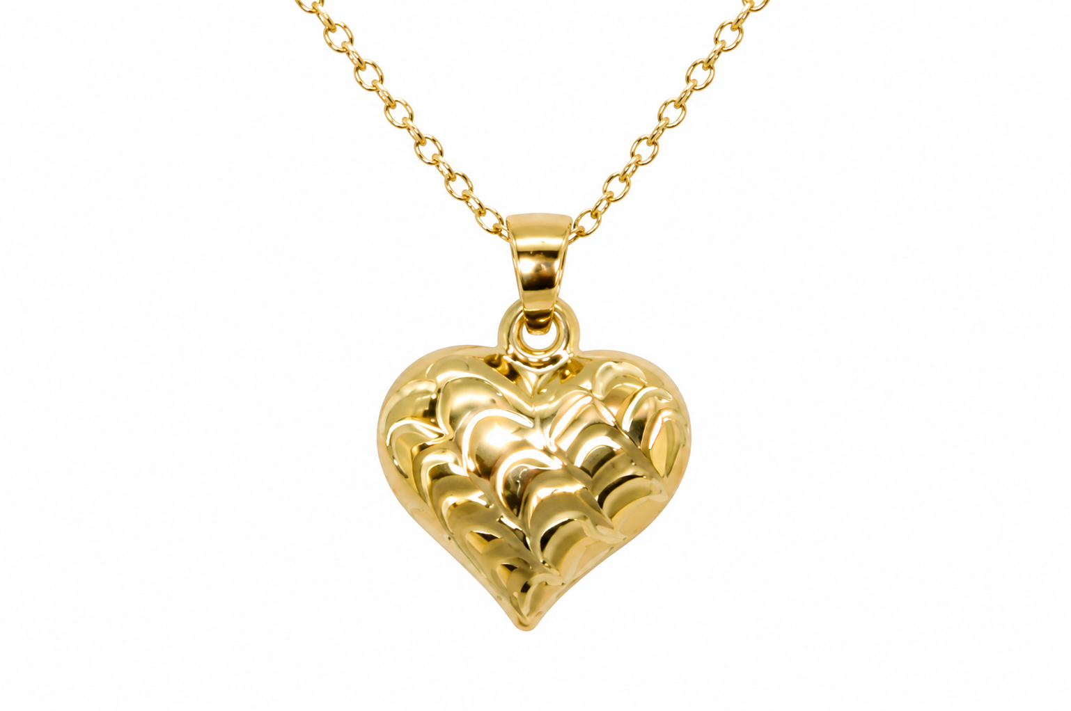 A 9ct gold patterned heart pendant closeup view