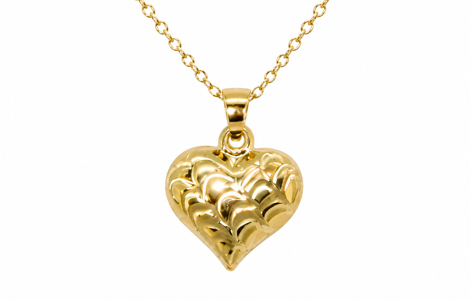 A 9ct gold patterned heart pendant closeup view