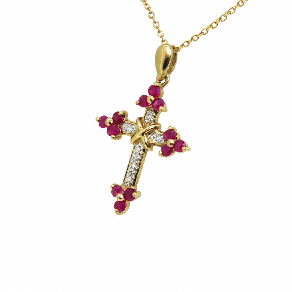 Side view of ruby and diamond cross