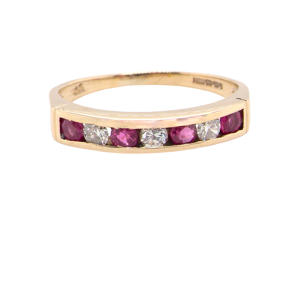 A 9 carat Yellow Gold Ruby & Diamond Eternity Ring