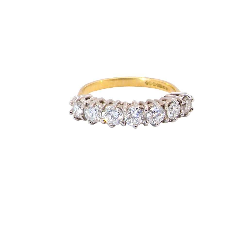 A Seven-Stone Half Hoop Diamond Ring