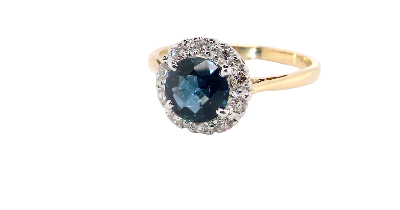 A Vintage 1960s Sapphire & Diamond Cluster Ring
