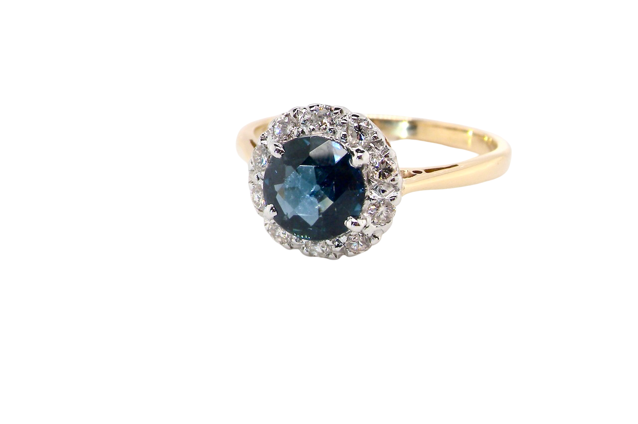A Vintage 1960s Sapphire & Diamond Cluster Ring