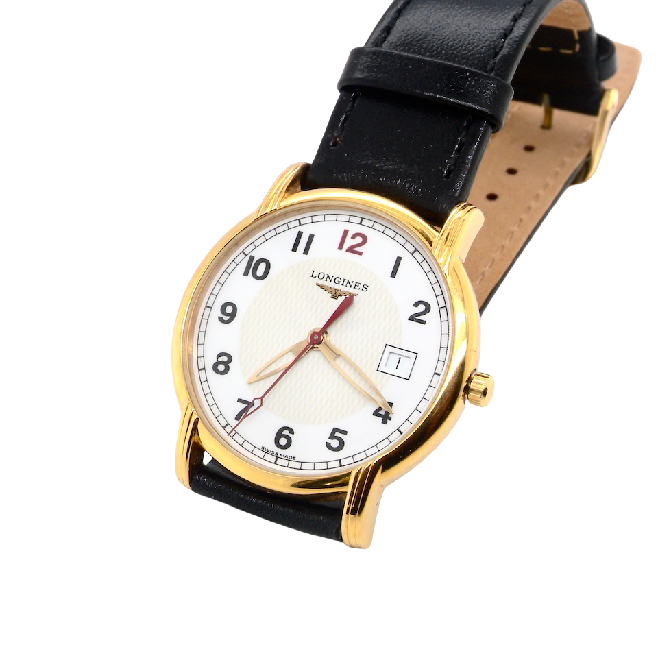 A gold plated wrist watch by Longines.