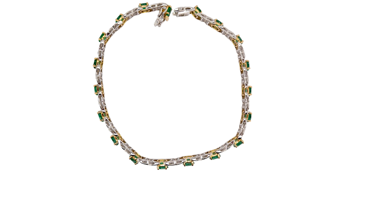 A white gold Emerald and Diamond bracelet