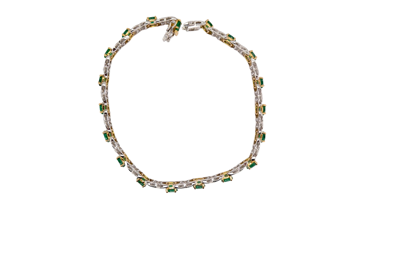 A white gold Emerald and Diamond bracelet