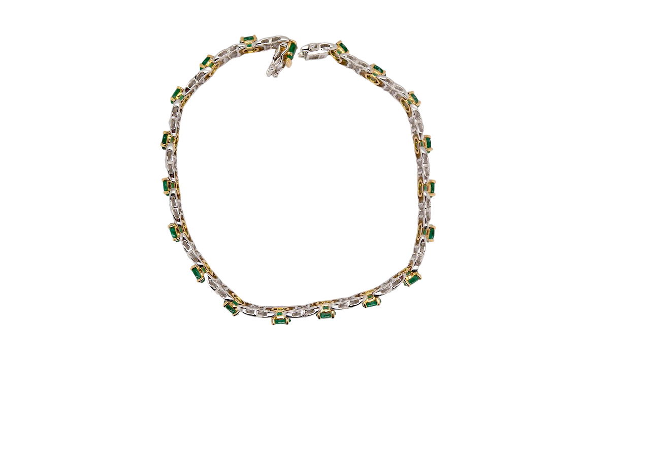 A white gold Emerald and Diamond bracelet