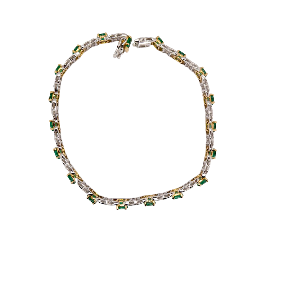 A white gold Emerald and Diamond bracelet