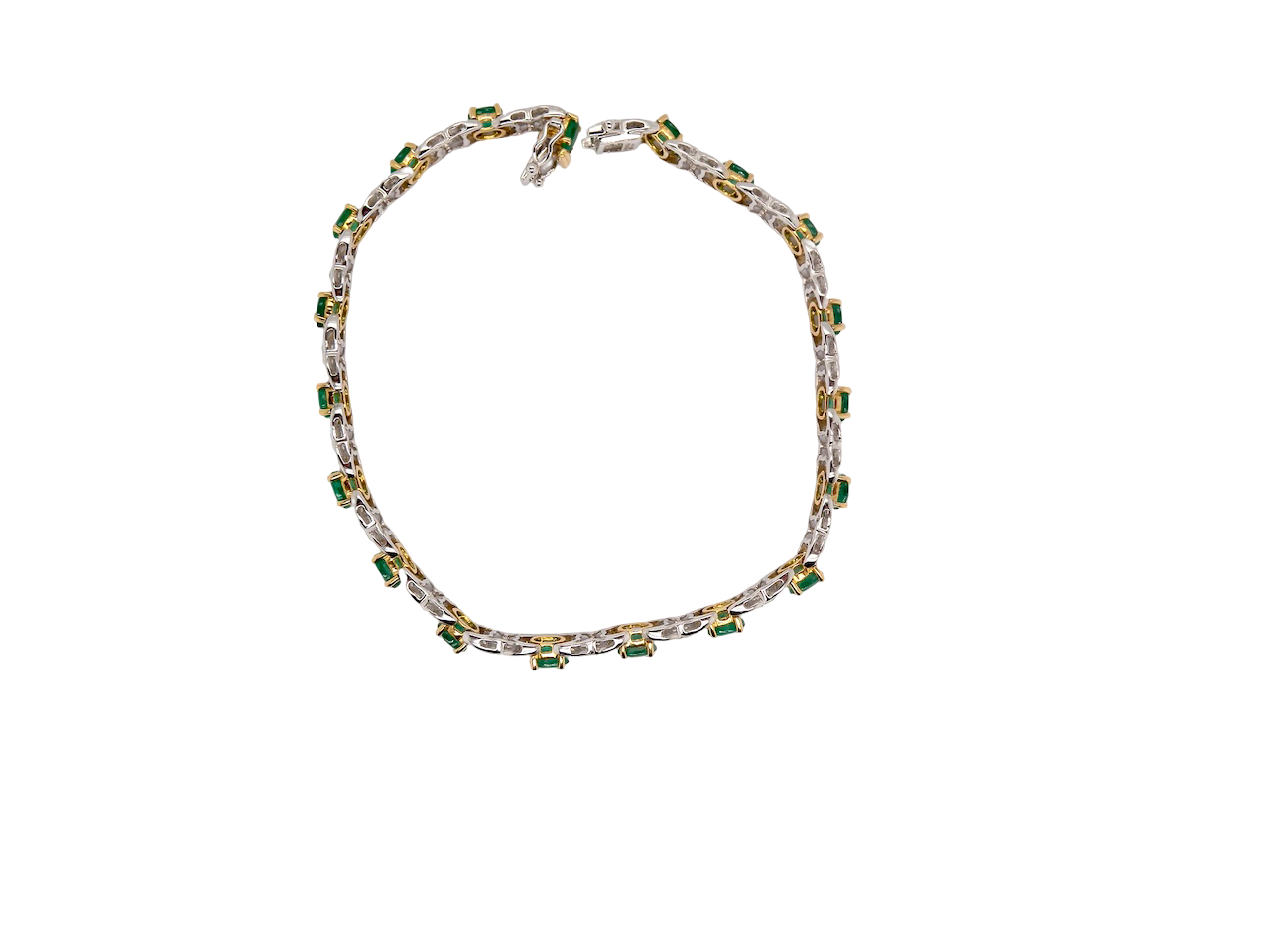 A white gold Emerald and Diamond bracelet