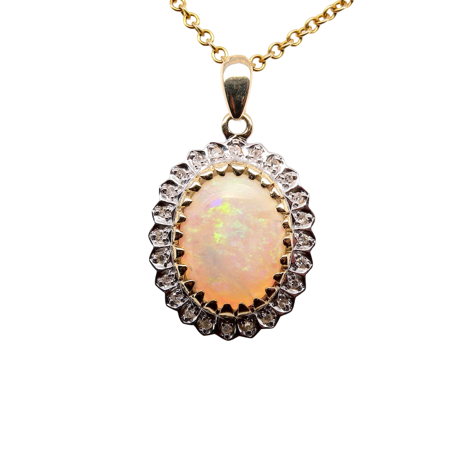 Opal pendant necklace with gold chain on a white background
