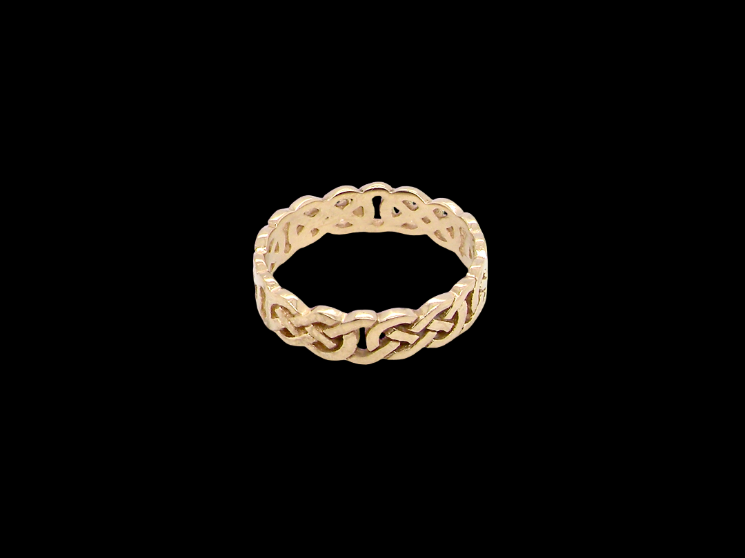 A Celtic design gold ring, could be used as a wedding ring,