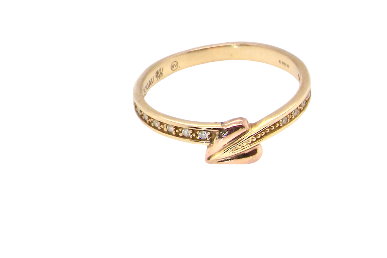 A Clogau ring which has set into the band twelve small white diamonds, each 1.2mm