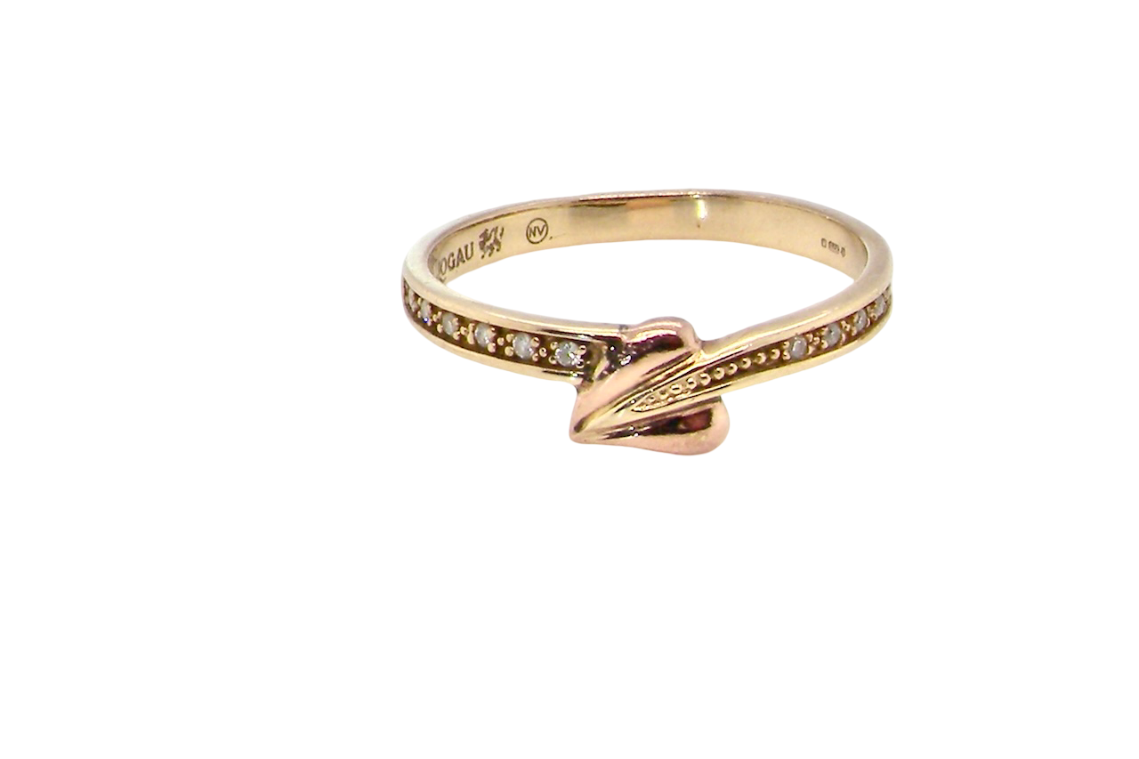 A Clogau ring which has set into the band twelve small white diamonds, each 1.2mm (est total 0.06 carats)