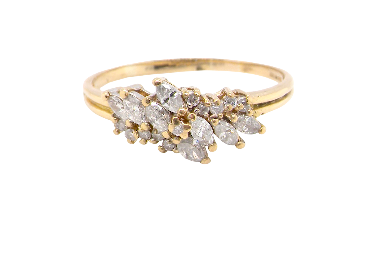 Gold ring with diamond stones on a white background