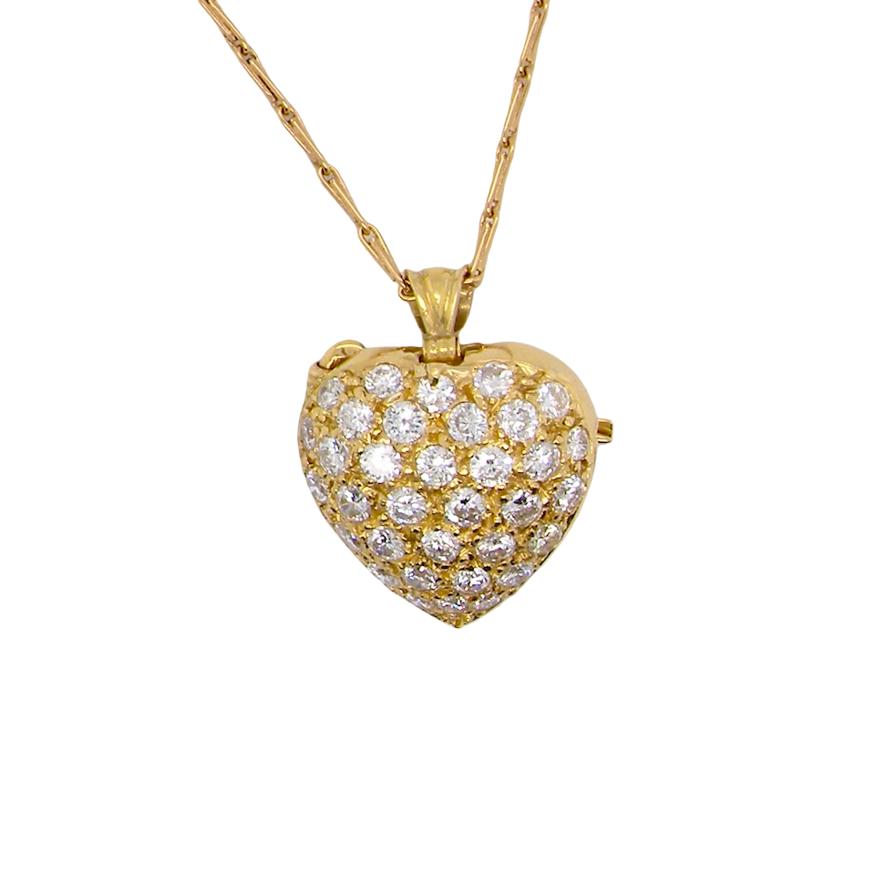 Gold heart-shaped necklace with diamond accents on a white background