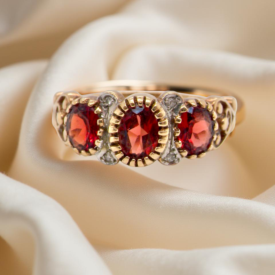 A Garnet and Diamond dress ring