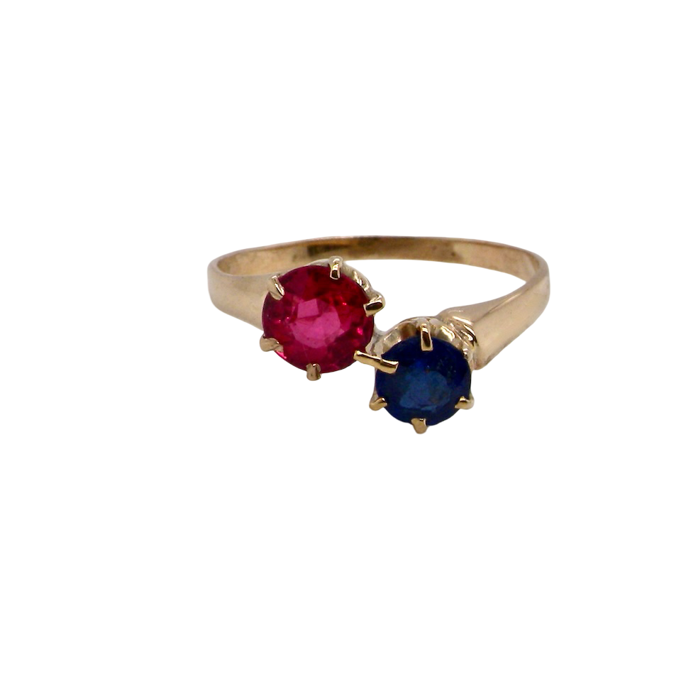 A Moi-et-Toi two stone sapphire ruby ring