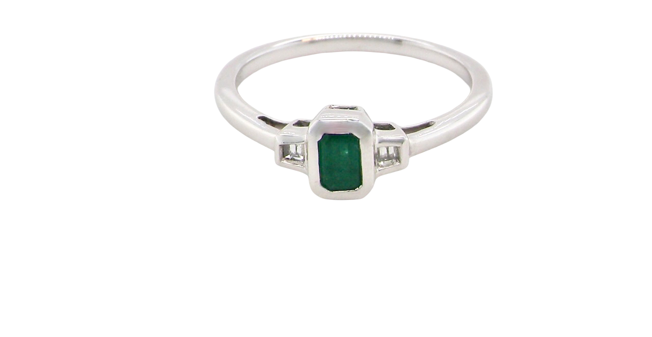 A NEW Emerald and Diamond ring