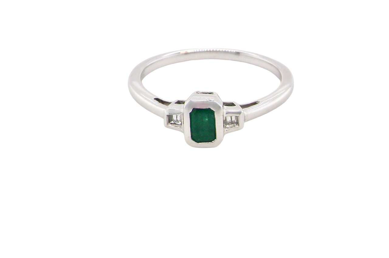A NEW Emerald and Diamond ring