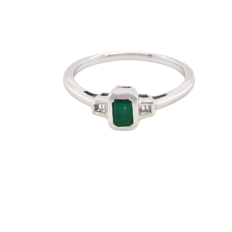 A NEW Emerald and Diamond ring