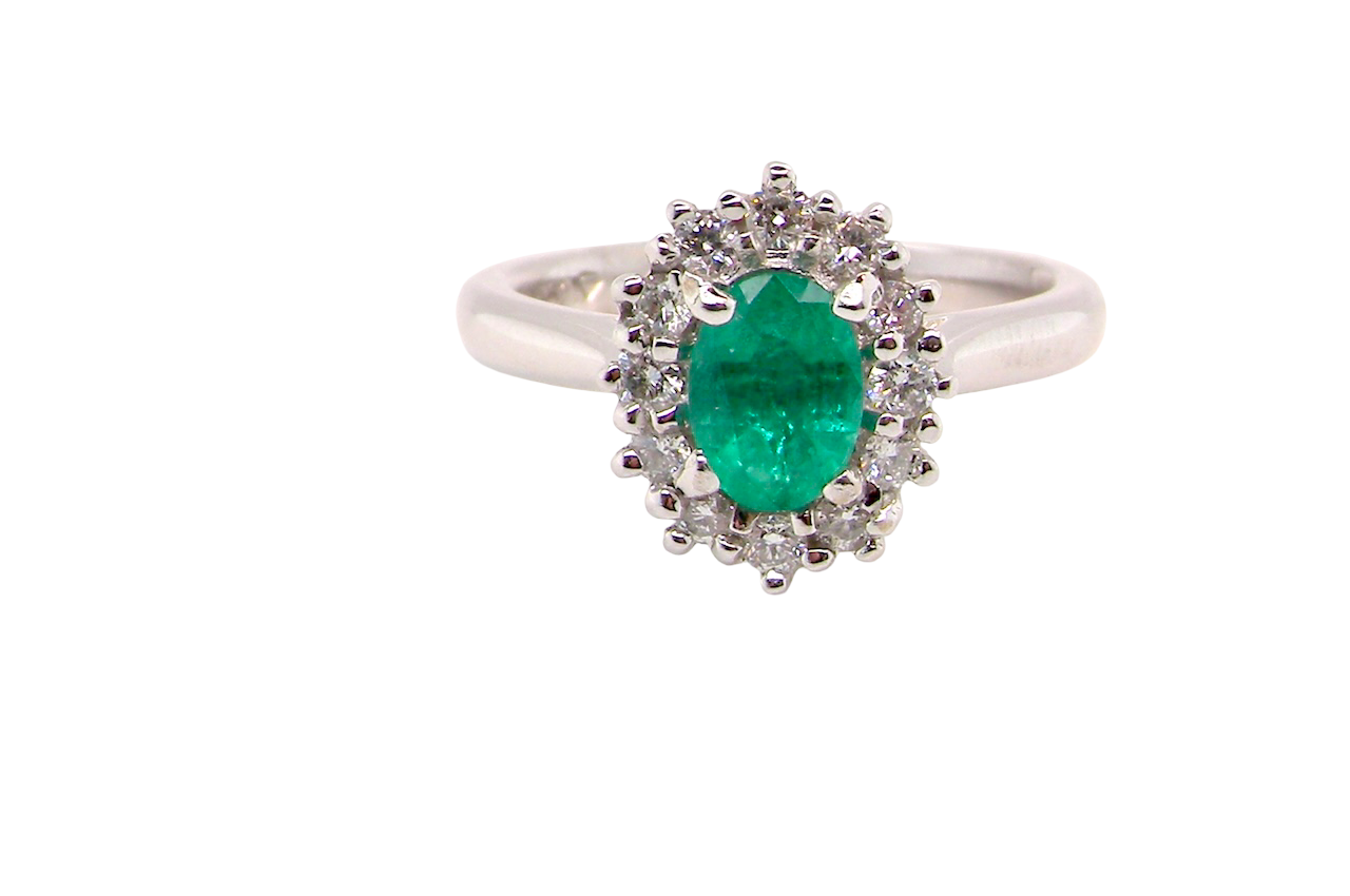A NEW Emerald and Diamond ring