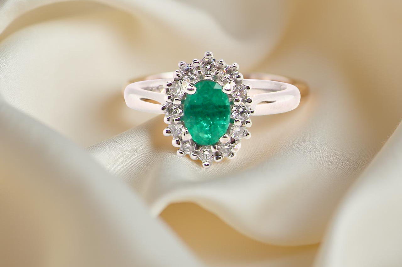 A NEW Emerald and Diamond ring