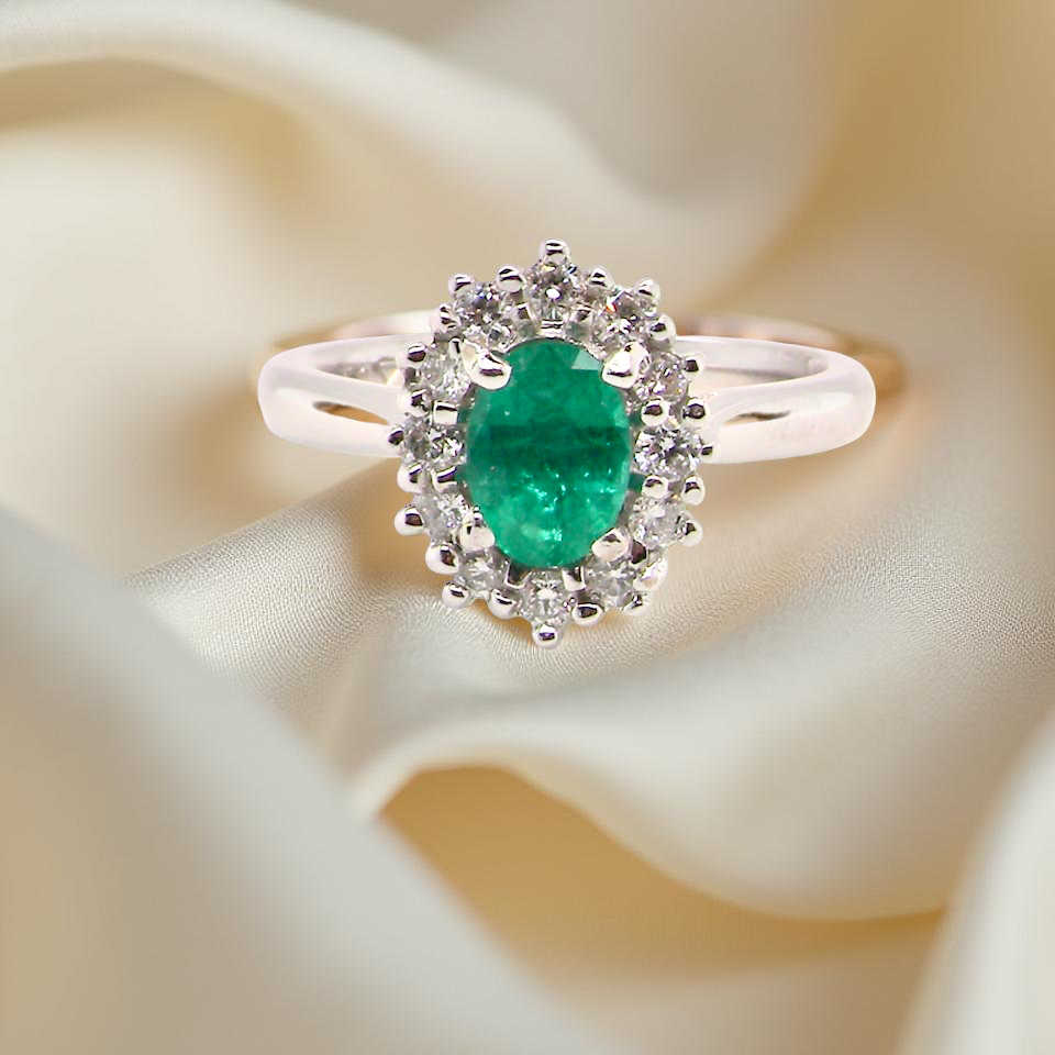 A NEW Emerald and Diamond ring