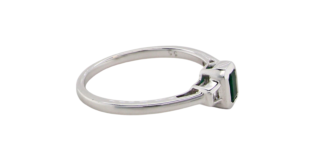 A NEW Emerald and Diamond ring