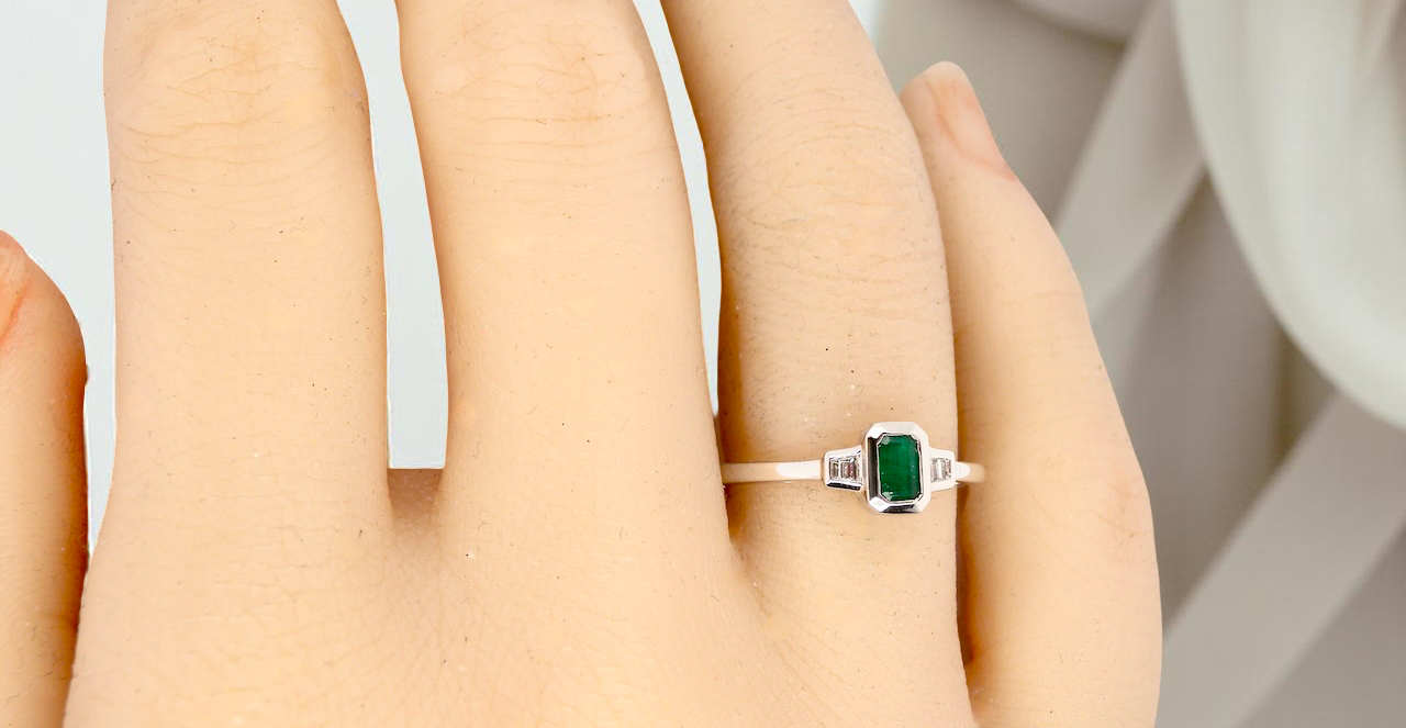 A NEW Emerald and Diamond ring