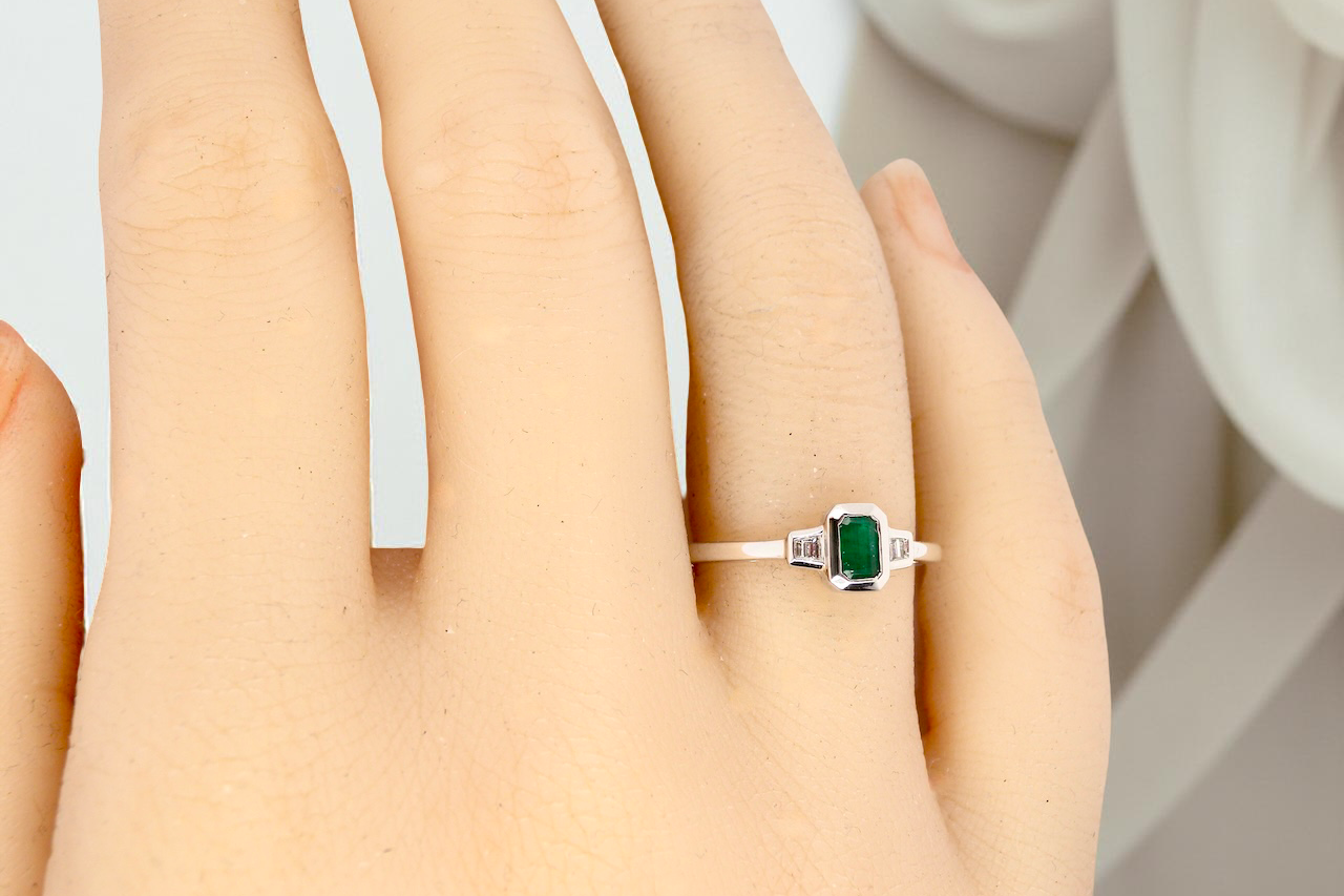 A NEW Emerald and Diamond ring
