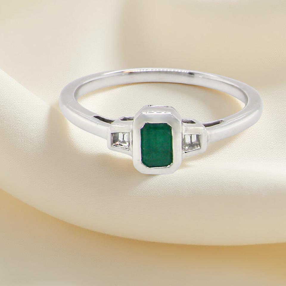 A NEW Emerald and Diamond ring