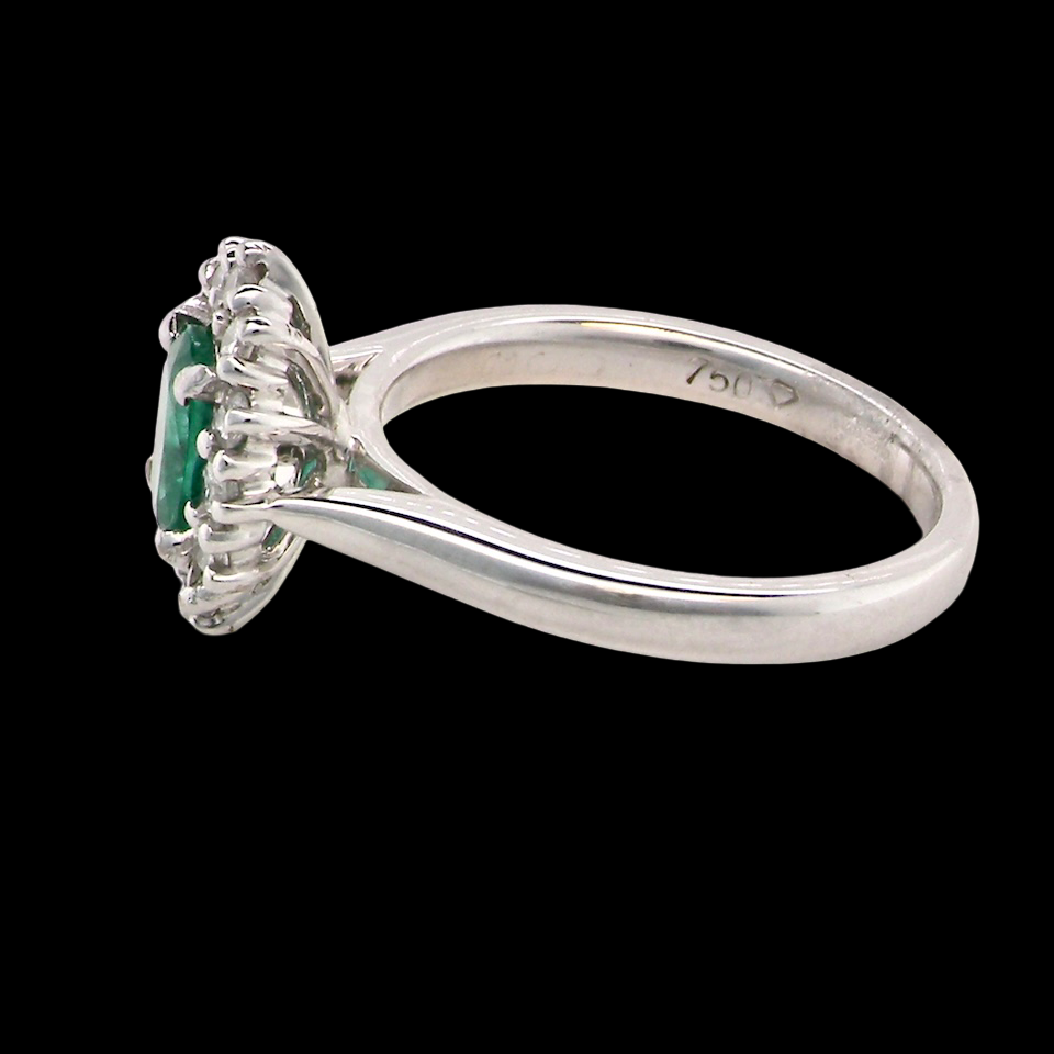 A NEW Emerald and Diamond ring