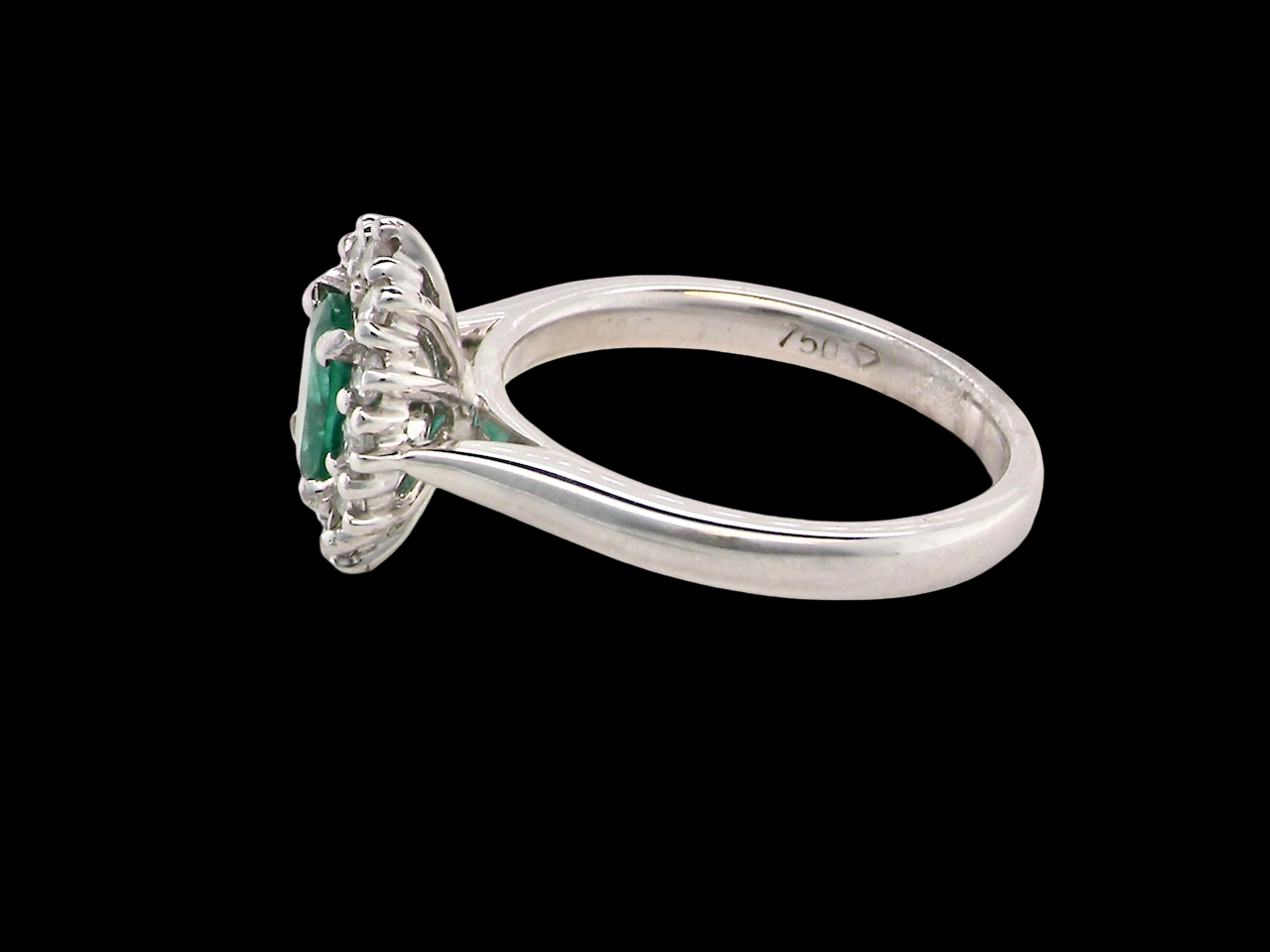 A NEW Emerald and Diamond ring