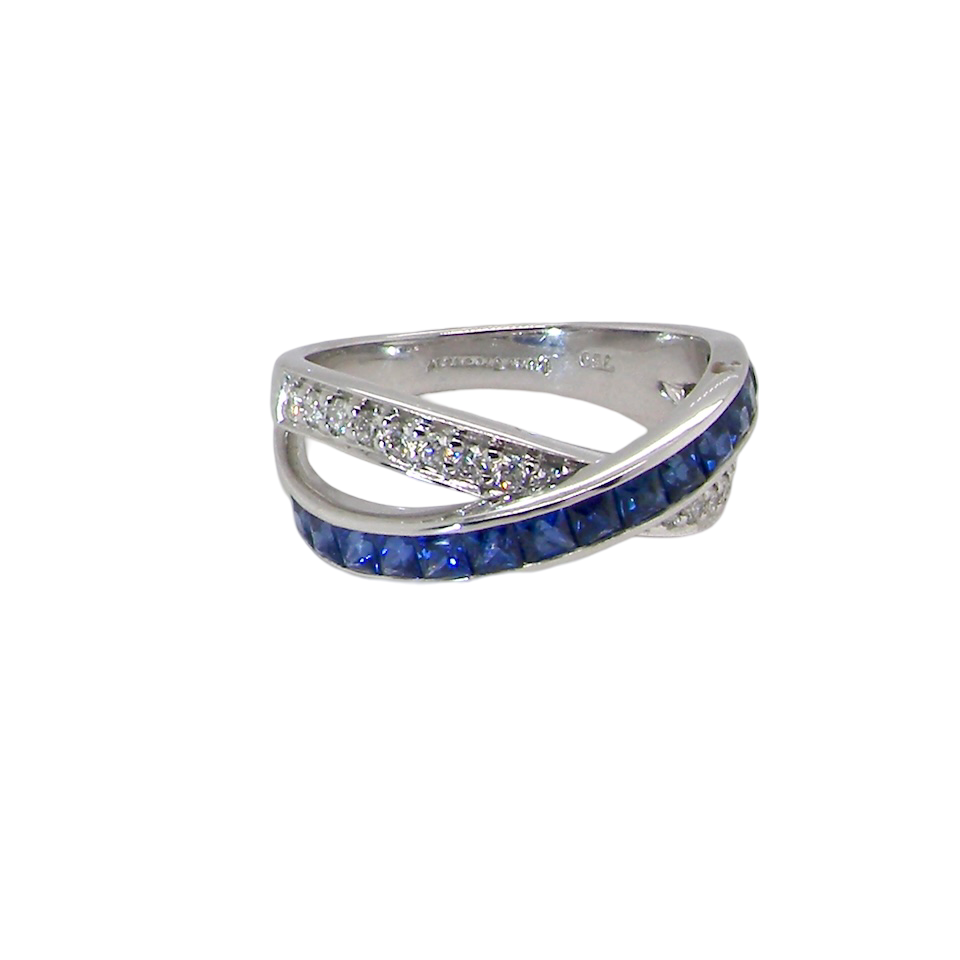 A NEW Sapphire and Diamond cross over ring