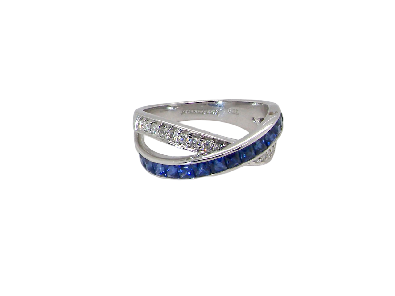 A NEW Sapphire and Diamond cross over ring