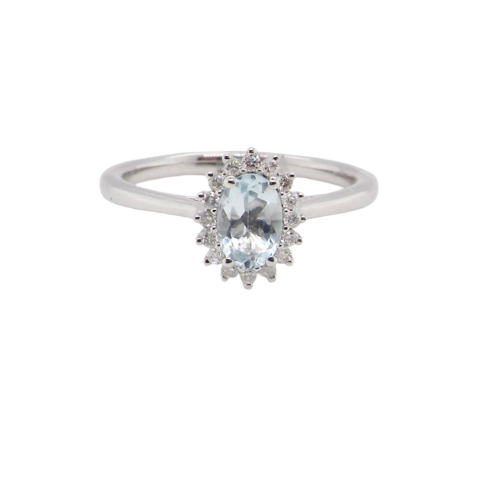 A NEW blue topaz and diamond ring