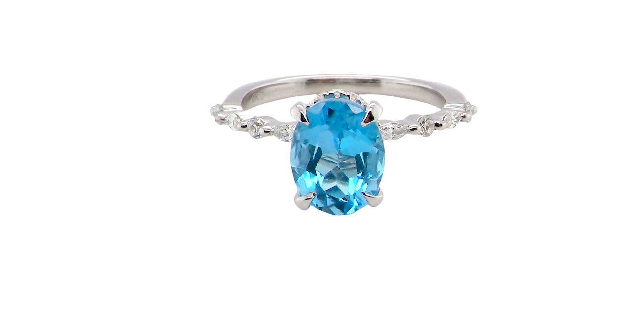 A NEW ring- but with a gemstone that we have taken from an old ring that was worn out, so its a new lease of life! The topaz measures 9x7mm.