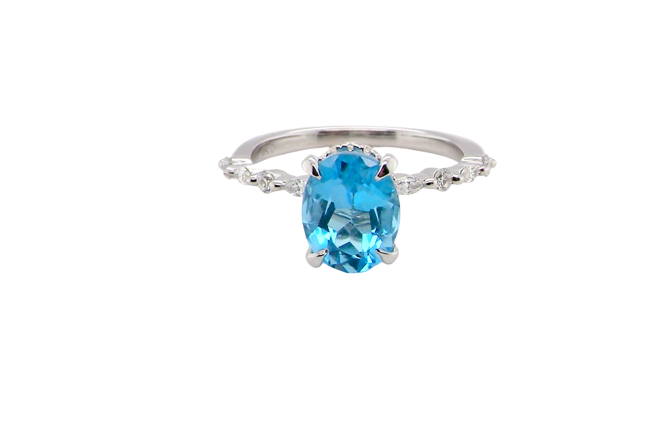 A NEW ring- but with a gemstone that we have taken from an old ring that was worn out, so its a new lease of life! The topaz measures 9x7mm.