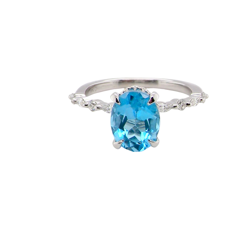 A NEW ring- but with a gemstone that we have taken from an old ring that was worn out, so its a new lease of life! The topaz measures 9x7mm.