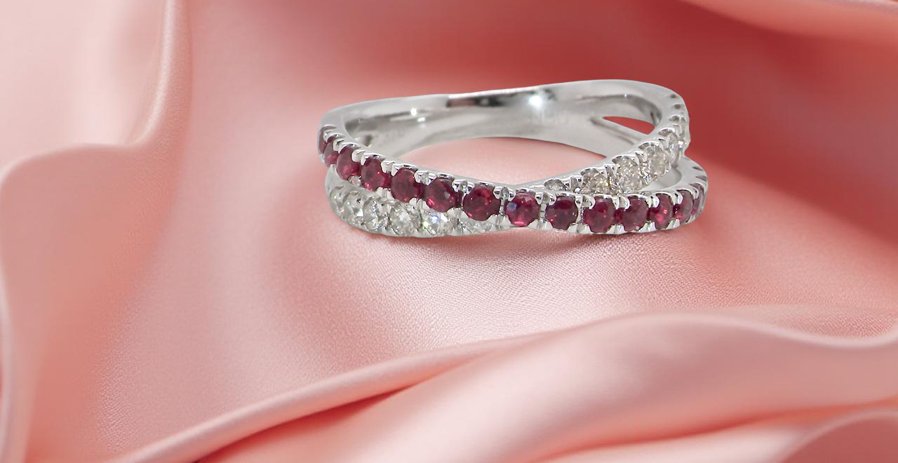 A NEW ruby and diamond cross over ring