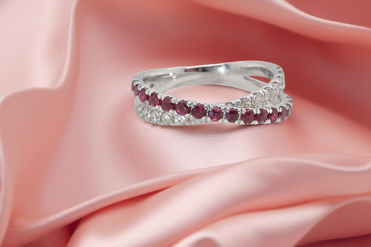 A NEW ruby and diamond cross over ring