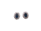 A Pair of Sapphire and Diamond Cluster Earrings